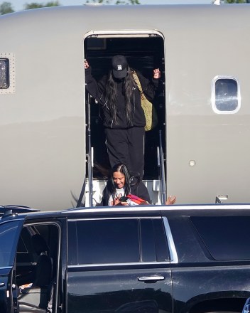 Los Angeles, CA  - *EXCLUSIVE*  - Rihanna and rapper boyfriend A$AP Rocky deplane their private jet with their newborn as they return to Los Angeles. A bodyguard carefully carries the baby in a car seat before A$AP, who wears a brown flannel top and blue straight jeans, hops off the flight with Rihanna in tow.

Pictured: Rihanna, A$AP Rocky

BACKGRID USA 14 AUGUST 2022 

USA: +1 310 798 9111 / usasales@backgrid.com

UK: +44 208 344 2007 / uksales@backgrid.com

*UK Clients - Pictures Containing Children
Please Pixelate Face Prior To Publication*