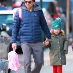Bradley Cooper and his daughter Lea get dressed for the cold weather!