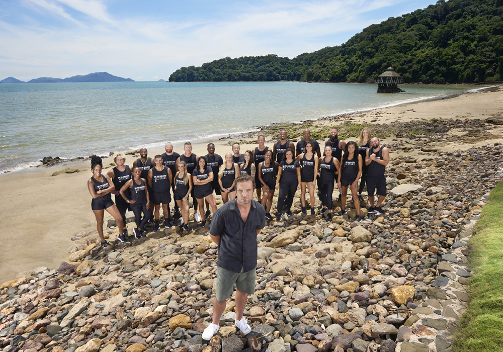 THE CHALLENGE: ALL STARS Season 3  -- T.J. Lavin host of THE CHALLENGE: ALL STARS with the cast: (back row L-R) Nia, MJ, Syrus, LB, Mark, Nehemiah, Tyler, Yes, Darrell, Laterrian, Brad and Melinda (front row, L-R) Roni, Jordan, Kendal, Sylvia, Jennye, Kailah, Cynthia, Tina, Kellyanne, Veronica, Jonna, and Derrick in THE CHALLENGE: ALL STARS season 3 streaming on Paramount+ Photo: Laura Barisonzi/MTV ENTERTAINMENT/Paramount+ ©2021 MTVE and CBS Interactive Inc. All Rights Reserved