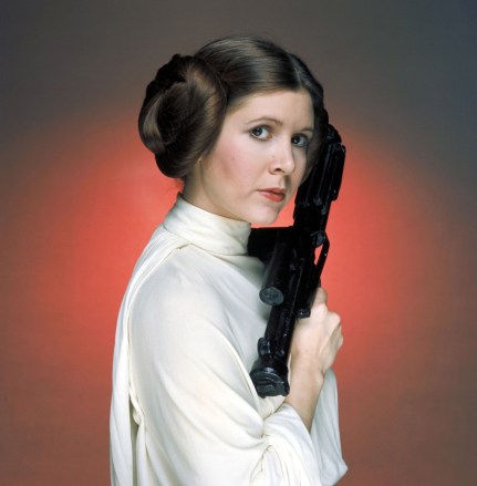 Editorial use only. No book cover usage.Mandatory Credit: Photo by Lucasfilm/Fox/Kobal/Shutterstock (5886297ew)Carrie FisherStar Wars Episode IV - A New Hope - 1977Director: George LucasLucasfilm/20th Century FoxUSAFilm PortraitScifiStar Wars (1977)La Guerre des étoiles