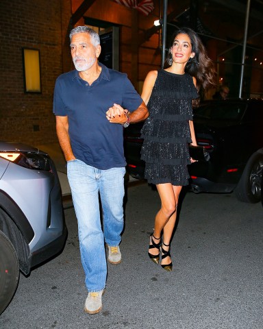 New York, NY  - George Clooney and Amal Clooney hold hands leaving The Greenwich Hotel in New York City after dinner at Locanda Verde.Pictured: George Clooney, Amal ClooneyBACKGRID USA 22 SEPTEMBER 2022 USA: +1 310 798 9111 / usasales@backgrid.comUK: +44 208 344 2007 / uksales@backgrid.com*UK Clients - Pictures Containing ChildrenPlease Pixelate Face Prior To Publication*