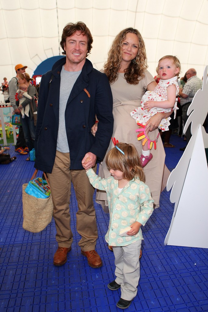 LONDON, ENGLAND - AUGUST 15:  (EXCLUSIVE ACCESS) Actors and husband and wife Toby Stephens and Anna-Louise Plowman and their children Eli and Tallulah attend 'In The Night Garden ... Live' in the Meridian Gardens at The O2 on August 15, 2010 in London, England.  (Photo by Jon Furniss/WireImage)