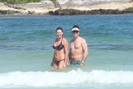 Tulum, MEXICO - *EXCLUSIVE* - Jerry O'Connell and Rebecca Romijn enjoy a family vacation with their kids in Tulum, Mexico.  The 49 year old The Talk co-host was slathered in a deep layer of sunscreen and sported a visor and sunglasses while out in the water with his wife and twins on Thursday.  Jerry's top half was so covered in a thick layer of sunscreen it appeared some of it may have run into his eyes as he went for a swim.  Rebecca, 50 slipped her fit body into a blue two piece as she was seen going for a swim in the sea.  The adorable couple have been married since 2007 and have twin girls.  Shot on February 23, 2023 Pictured: Jerry O'Connell and Rebecca Romijn BACKGRID USA 25 FEBRUARY 2023 USA: +1 310 798 9111 / usasales@backgrid.com UK: +44 208 344 2007 / uksales@backgrid.com *UK Clients - Pictures Containing Children Please Pixelate Face Prior To Publication*