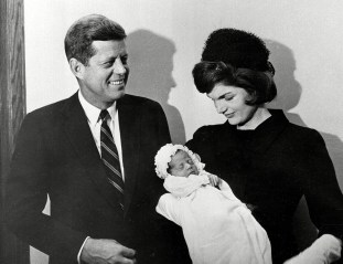 President John F. Kennedy and first lady Jacqueline Kennedy pose at Georgetown University Hospital in Washington with their son, John F. Kennedy Jr., following a baptism for the infant. The younger Kennedy was born Nov. 25. A documentary film on John Kennedy Jr.'s life opens, in select theaters
Film JFK Jr Documentary, Washington, USA