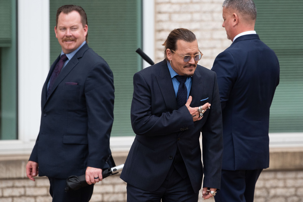 (RESTRICTION: NO New York or New Jersey Newspapers or newspapers within a 75 mile radius of any part of New York, New York, including without limitation the New York Daily News, The New York Times, and Newsday.)
Mandatory Credit: Photo by Shutterstock (12967675ae)
Johnny Depp bows to his fans during a recess in his civil trial with Amber Heard, at the Fairfax County Courthouse, in Fairfax, Va.,. Depp brought a defamation lawsuit against his former wife, actress Amber Heard, after she wrote an op-ed in The Washington Post in 2018 that, without naming Depp, accused him of domestic abuse. Credit: Cliff Owen / CNP (RESTRICTION: NO New York or New Jersey Newspapers or newspapers within a 75 mile radius of New York City)
Johnny Depp vs Amber Heard Trial, Fairfax, Virginia, USA - 27 May 2022