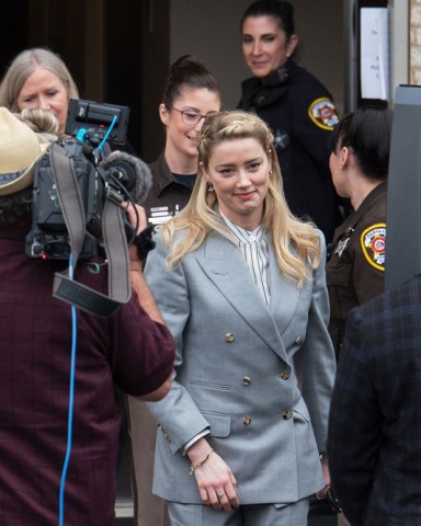 Actress Amber Heard departs departs the Fairfax County Courthouse in Fairfax, Va. A jury heard closing arguments in Johnny Depp's high-profile libel lawsuit against ex-wife Amber Heard. Lawyers for Johnny Depp and Amber Heard made their closing arguments to a Virginia jury in Depp's civil suit against his ex-wife
Depp-Heard Trial, Fairfax, United States - 27 May 2022