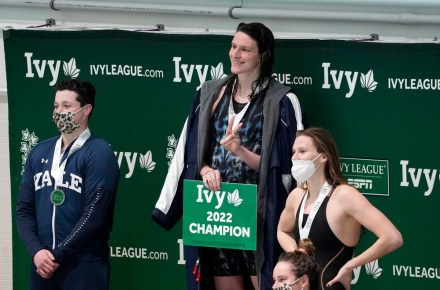 Pennsylvania's Lia Thomas, center, Yale's Iszak Henig, left, and Princeton's Nikki Venema stand on the podium following a medal ceremony after Thomas won the 100-yard freestyle, Henig finished second and Venema third at the Ivy League women's swimming and diving championships at Harvard, in Cambridge, Mass. Henig, who is transitioning to male but hasn't begun hormone treatments yet, is swimming for the Yale women's team and Thomas, who is transitioning to female, is swimming for the Penn women's team
Ivy League Transgender Athletes Swimming, Cambridge, United States - 19 Feb 2022