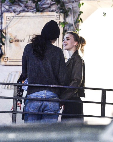 EXCLUSIVE: Lily-Rose Deppp Is All Smiles While At Dinner With Boyfriend Yassine Stein After Her Father Johnny Depp's Big Defamation Trial Win Against Amber Heard. The Model & Actress Who Just Celebrated Her 23rd Birthday Was Spotted Taking A Smoke Break And Showing Lot Of Pda With Her Boyfriend During The Celebratory Romantic Dinner Which Took Place At The Sunset Tower In West Hollywood, CA. 01 Jun 2022 Pictured: Lily-Rose Depp Is All Smiles While At Dinner With Boyfriend Yassine Stein. Photo credit: @CelebCandidly / MEGA TheMegaAgency.com +1 888 505 6342 (Mega Agency TagID: MEGA864373_004.jpg) [Photo via Mega Agency]