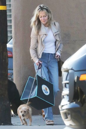 West Hollywood, CA - *EXCLUSIVE* Melanie Griffith was spotted bringing lunch with her dog from the Petrossian Restaurant & Store in West Hollywood.  Photo: Melanie Griffith BACKGRID USA December 19, 2022 TRACKING MUST READ: PrimePix / BACKGRID USA: +1 310 798 9111 / usasales@backgrid.com United Kingdom: +44 208 344 2007 / uksales@backgrid.com *UK customers - Please have images containing children Face Pixels before publishing*