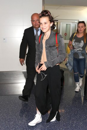 Millie Bobby Brown is seen at LAX in Los Angeles, California.Pictured: Millie Bobby BrownRef: SPL1494811 090517 NON-EXCLUSIVEPicture by: SplashNews.comSplash News and PicturesUSA: +1 310-525-5808London: +44 (0)20 8126 1009Berlin: +49 175 3764 166photodesk@splashnews.comWorld Rights, No France Rights