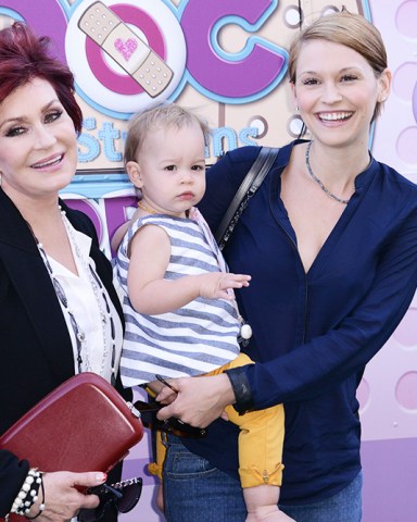 Sharon Osbourne, Pearl Osbourne, Lisa Stelly ;
Disney 'Doc Mcstuffins' event, Los Angeles, America - 26 Sep 2013
Green carpet for the Health-Focused "Doc Mobile" Tour For Kids And Families held at the Grove in Los Angeles