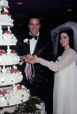 Editorial use onlyMandatory Credit: Photo by Snap/Shutterstock (390852fj)FILM STILLS OF 1967, CLOTHING, EATING, GETTING MARRIED, MARRIED COUPLES, ELVIS PRESLEY, PRISCILLA PRESLEY, TUXEDO, WEDDING CAKE, WEDDING GOWN, WEDDINGS/BRIDES IN 1967VARIOUS