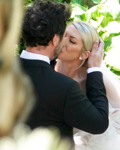 EXCLUSIVE: Stassi Schroeder surprises husband Beau Clark with her new wedding dress ahead of the second upcoming ceremony in Rome. 12 May 2022 Pictured: Stassi Schroeder; Beau Clark. Photo credit: ROMA/MEGA TheMegaAgency.com +1 888 505 6342 (Mega Agency TagID: MEGA856695_022.jpg) [Photo via Mega Agency]