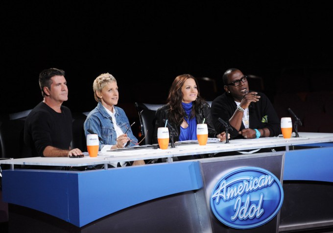 Simon Cowell, Ellen Degeneres, Kara DioGuardi, and Randy Jackson judge a contestant on ‘Idol’
