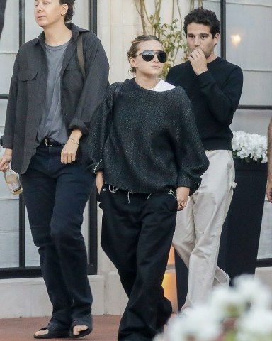 Pacific Palisades, CA - *EXCLUSIVE* - Ashley Olsen and her boyfriend Louis Eisner head to the movies with friends to see 'Once Upon a Time In Hollywood'. The group entered right after newlyweds Chris Pratt and Katherine Schwarzenegger, who walked in minutes before.Pictured: Ashley Olsen, Louis EisnerBACKGRID USA 29 JULY 2019 USA: +1 310 798 9111 / usasales@backgrid.comUK: +44 208 344 2007 / uksales@backgrid.com*UK Clients - Pictures Containing ChildrenPlease Pixelate Face Prior To Publication*