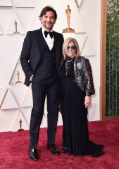 Bradley Cooper, left, and Gloria Campano arrive at the Oscars, at the Dolby Theatre in Los Angeles
94th Academy Awards - Arrivals, Los Angeles, United States - 27 Mar 2022