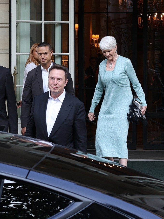 Elon Musk and his relatives leave their hotel to go to the National Library in Paris