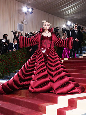 Gigi Hadid Gives Corsets a Versace Makeover in Latex Catsuit & Spike Heels  for Met Gala 2022
