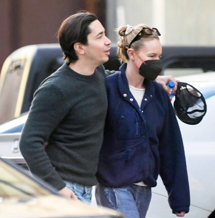 EXCLUSIVE: Kate Bosworth and her beau Justin Long step out in Pasadena after sparking engagement rumors over the weekend. The couple were seen heading to a sushi restaurant. Kate wore an oversized sweater and jeans and kept her look incognito with a black facemask. Justin was all smiles and put his arm around his lady as they stepped out on the town. 15 Mar 2023 Pictured: Kate Bosworth and Justin Long. Photo credit: MEGA TheMegaAgency.com +1 888 505 6342 (Mega Agency TagID: MEGA956730_014.jpg) [Photo via Mega Agency]