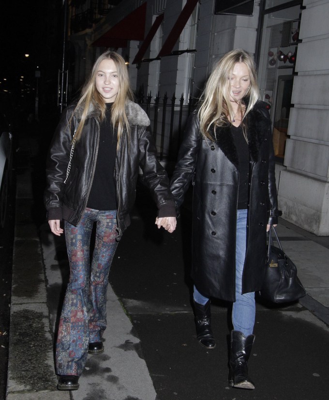 Kate Moss and Lila Grace Moss walk hand in hand
