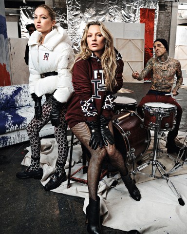 Kate Moss and lookalike daughter Lila star in this Andy Warhol-inspired fashion campaign for Tommy Hilfiger. Kate, 48, and Lila, 19, appear alongside drummer Travis Barker in the fall 2022 promo. Soo Joo Park, Georgia Palmer, Jon Batiste, Anthony Ramos, Lady Bunny, Steve Wiebe, and others also feature. The look was inspired by pop artist Warhol's famous Factory in New York City. "We’ve taken the spirit of Andy Warhol’s famed Factory and reimagined it in red, white and blue – colliding people and perspectives to spark new creativity," the brand said. The images were shot by Craig McDean for Tommy Hilfiger in the Bronx. Editorial usage. Credit Courtesy of Tommy Hilfiger / MEGA. 15 Sep 2022 Pictured: Kate Moss, Lila Moss, Travis Barker. Photo credit: Courtesy of Tommy Hilfiger/MEGA TheMegaAgency.com +1 888 505 6342 (Mega Agency TagID: MEGA896477_002.jpg) [Photo via Mega Agency]