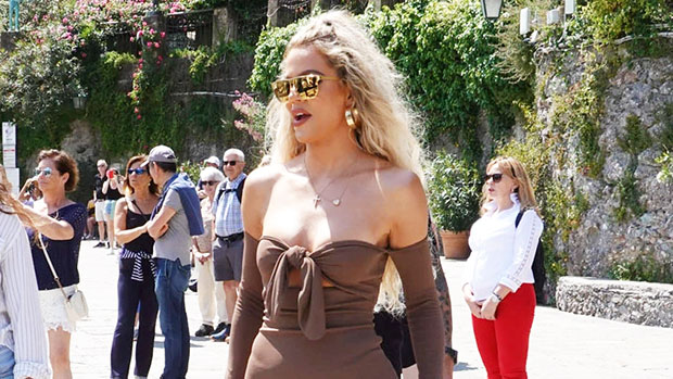 Khloé Kardashian Takes to the Streets of Italy in Lace-Up Knee-High Boots &  Cut-Out Mini Dress