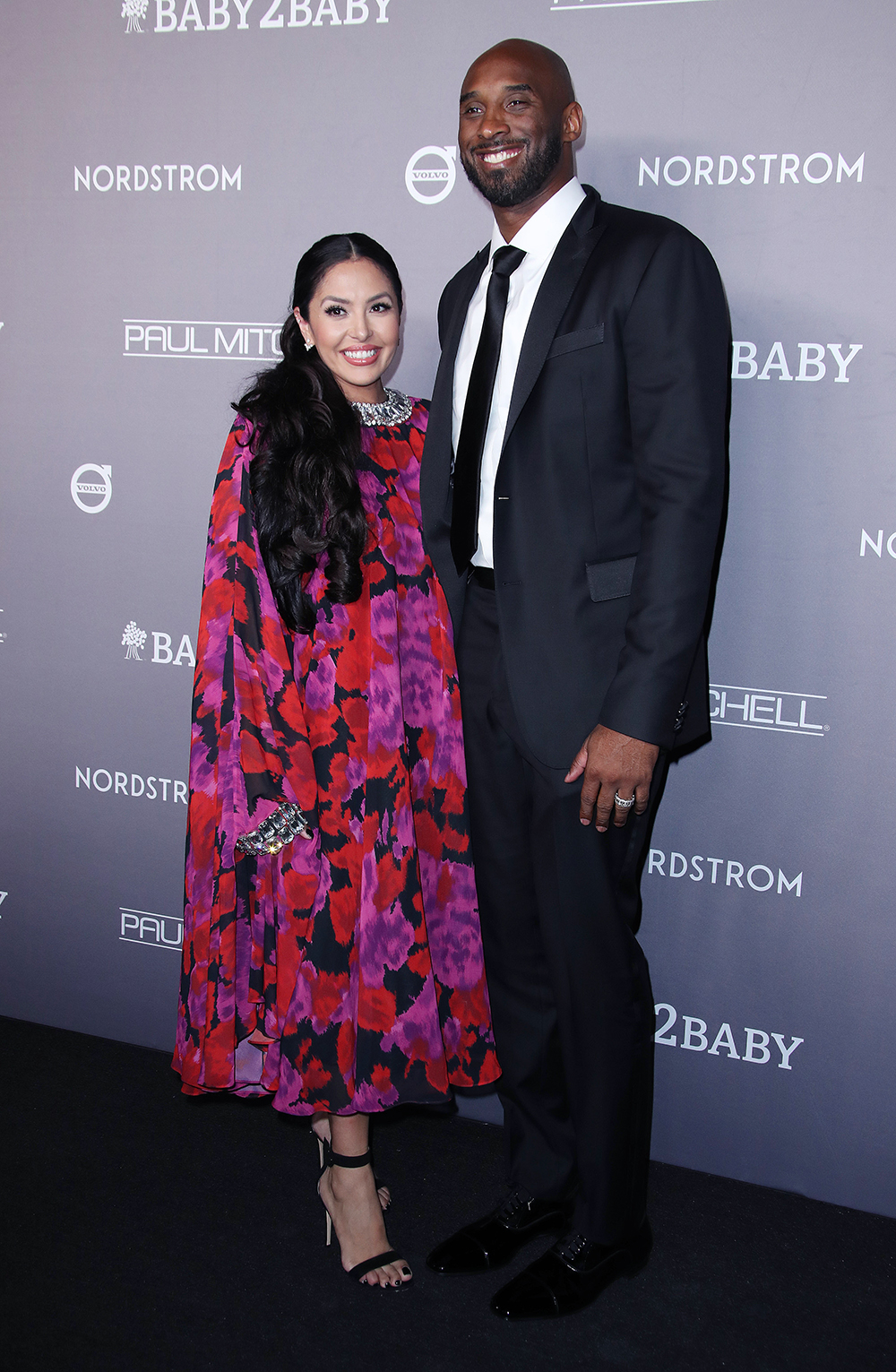 Kobe Bryant dons teal suit out with wife Vanessa in LA