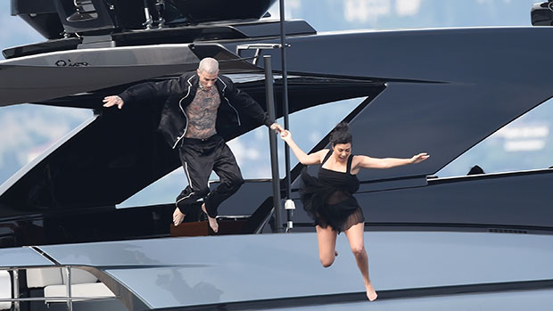 Kourtney Kardashian & Travis Barker jump off yacht after wedding – Hollywood Life