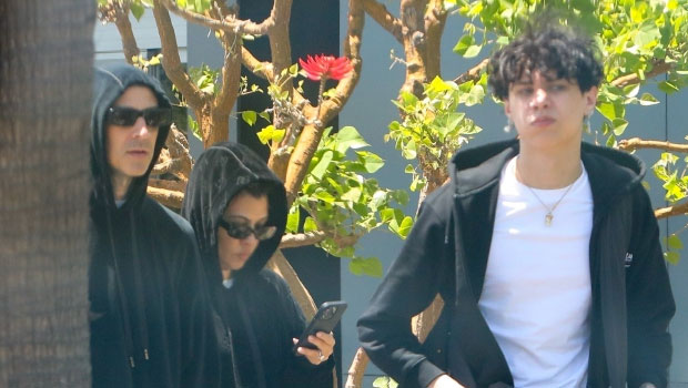 Kourtney Kardashian & Travis Barker Hold Hands Returning To LA With His Son Landon, 18: Photos