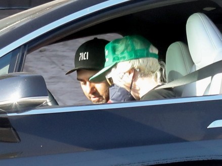 Malibu, CA  - *EXCLUSIVE*  - Lady Gaga and boyfriend Michael Polansky pick up his car that was parked on PCH in Malibu. The pop star wore a green cap over her hair which appeared to have been chopped down just beneath her ear  with a strand of hair left long to her shoulders.  Pictured: Lady Gaga, Michael Polansky  BACKGRID USA 10 MAY 2022   BYLINE MUST READ: RMBI / BACKGRID  USA: +1 310 798 9111 / usasales@backgrid.com  UK: +44 208 344 2007 / uksales@backgrid.com  *UK Clients - Pictures Containing Children Please Pixelate Face Prior To Publication*