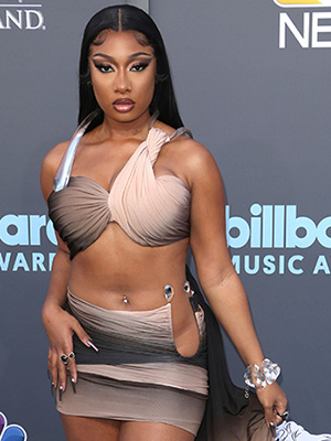 Video: Megan Thee Stallion rocks EXTREMELY short dress with seductive open  breasts