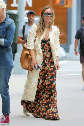 Olivia Wilde wears a floral Maxi dress with a fluffy coat in New York CityPictured: Olivia WildeRef: SPL5312212 200522 NON-EXCLUSIVEPicture by: Christopher Peterson / SplashNews.comSplash News and PicturesUSA: +1 310-525-5808London: +44 (0)20 8126 1009Berlin: +49 175 3764 166photodesk@splashnews.comWorld Rights