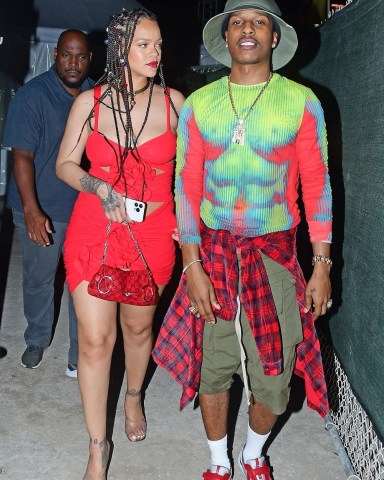 Bridgetown, BARBADOS  - *EXCLUSIVE*  - Rihanna looks sizzling hot as she steps out with boyfriend A$AP Rocky for a fun night at the Imagine reggae show while on holiday in Barbados. The two made a bold impression as ASAP complimented Rihanna's flirty red dress with a thermal energy-inspired shirt and detailed red pieces to complete his coordinating look. The two love birds kept close to each other as they interacted with the public.Pictured: Rihanna, A$AP RockyBACKGRID USA 28 NOVEMBER 2022 BYLINE MUST READ: @246PAPS / BACKGRIDUSA: +1 310 798 9111 / usasales@backgrid.comUK: +44 208 344 2007 / uksales@backgrid.com*UK Clients - Pictures Containing ChildrenPlease Pixelate Face Prior To Publication*