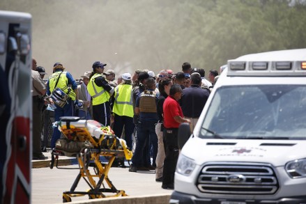 Emergency personnel gather near Robb Elementary School following a shooting, in Uvalde, Texas Texas School-Shooting, Uvalde, United States - May 24, 2022