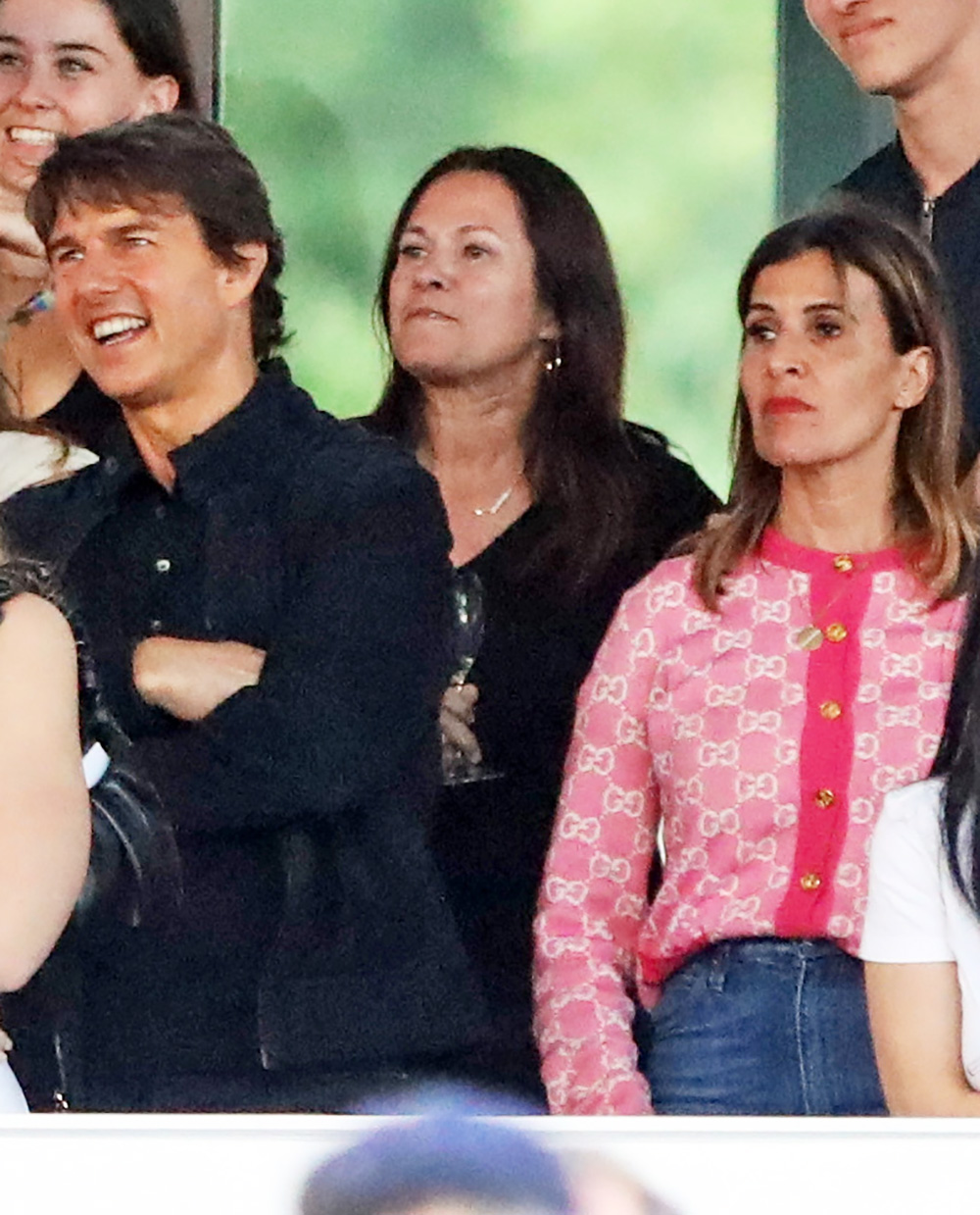 EXCLUSIVE: Tom Cruise is joined by mystery woman and a host of stars at Adele concert