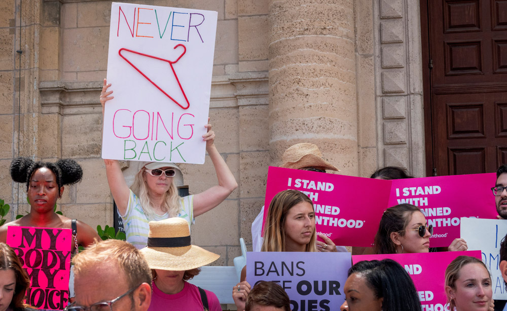 Pro choice demonstrators protest in reaction to leaked draft document that the Supreme Court is prepared to overturn Roe v. Wade, in Miami, Florida, USA, 03 May 2022.  According to the leaked report, obtained by Politico, the high court has cast an initial vote to strike down the landmark abortion-rights decision Roe v. Wade.
Pro choice demonstrators protest in reaction to leaked draft document that Supreme Court is prepared to overturn Roe v. Wade, Miami, USA - 03 May 2022