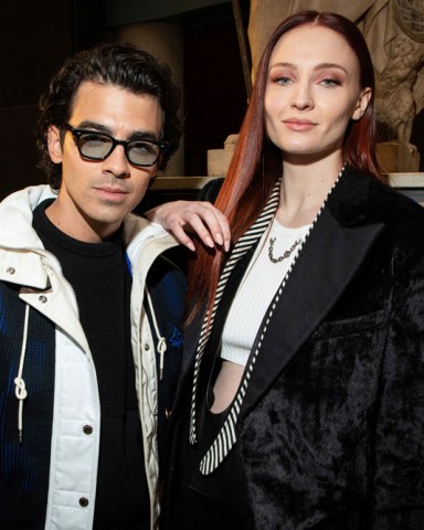 Joe Jonas, left, and Sophie Turner attend the Louis Vuitton Ready To Wear Fall/Winter 2022-2023 fashion collection, unveiled during the Fashion Week in Paris
Fashion Vuitton F/W 22-23 Front Row, Paris, France - 07 Mar 2022