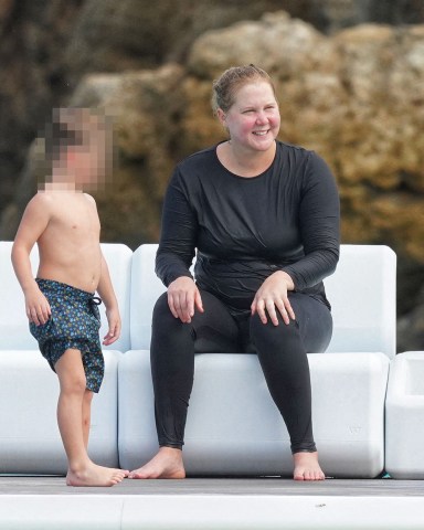 Amy Schumer with husband Chris Fischer and son Gene David Fischer having a fun day at the beach in Saint Barts, French West Indies on December 27, 2022. Photo by ABACAPRESS.COM

**USE CHILD PIXELATED IMAGES IF YOUR TERRITORY REQUIRES IT**

Pictured: Amy Schumer
Ref: SPL5511875 271222 NON-EXCLUSIVE
Picture by: AbacaPress / SplashNews.com

Splash News and Pictures
USA: +1 310-525-5808
London: +44 (0)20 8126 1009
Berlin: +49 175 3764 166
photodesk@splashnews.com

United Arab Emirates Rights, Australia Rights, Bahrain Rights, Canada Rights, Greece Rights, India Rights, Israel Rights, South Korea Rights, New Zealand Rights, Qatar Rights, Saudi Arabia Rights, Singapore Rights, Thailand Rights, Taiwan Rights, United Kingdom Rights, United States of America Rights
