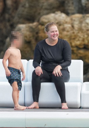Amy Schumer with husband Chris Fischer and son Gene David Fischer having a fun day at the beach in Saint Barts, French West Indies on December 27, 2022. Photo by ABACAPRESS.COM**USE CHILD PIXELATED IMAGES IF YOUR TERRITORY REQUIRES IT**Pictured: Amy SchumerRef: SPL5511875 271222 NON-EXCLUSIVEPicture by: AbacaPress / SplashNews.comSplash News and PicturesUSA: +1 310-525-5808London: +44 (0)20 8126 1009Berlin: +49 175 3764 166photodesk@splashnews.comUnited Arab Emirates Rights, Australia Rights, Bahrain Rights, Canada Rights, Greece Rights, India Rights, Israel Rights, South Korea Rights, New Zealand Rights, Qatar Rights, Saudi Arabia Rights, Singapore Rights, Thailand Rights, Taiwan Rights, United Kingdom Rights, United States of America Rights
