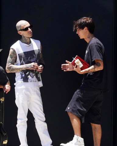 Calabasas, CA  - *EXCLUSIVE*  - Travis Barker is greeted by friends and employees as he makes a quick stop at his Calabasas recording studio, after a recent health scare and hospitalization.

Pictured: Travis Barker

BACKGRID USA 11 JULY 2022 

USA: +1 310 798 9111 / usasales@backgrid.com

UK: +44 208 344 2007 / uksales@backgrid.com

*UK Clients - Pictures Containing Children
Please Pixelate Face Prior To Publication*