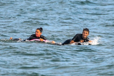 Dua Lipa and her boyfriend Anwar Hadid have a blast surfing in Malibu. 23 Aug 2020 Pictured: Dua Lipa and Anwar Hadid. Photo credit: Marksman / MEGA TheMegaAgency.com +1 888 505 6342 (Mega Agency TagID: MEGA695755_009.jpg) [Photo via Mega Agency]