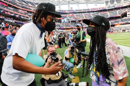 Rapper and producer Jay Z (L) chats with his daughter Blue Ivy Carter while on the field before the start of Super Bowl LVI between the Cincinnati Bengals and the Los Angeles Rams at SoFi Stadium in Los Angeles on Sunday, February 13, 2022.
Super Bowl Lvi, Los Angeles, California, United States - 13 Feb 2022