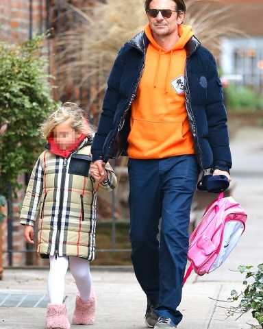 New York, NY - The birthday boy held his daughter by the hand as they stroll down New York City together. Pictured: Bradley Cooper BACKGRID USA 5 JANUARY 2023 USA: +1 310 798 9111 / usasales@backgrid.com UK: +44 208 344 2007 / uksales@backgrid.com *UK Clients - Pictures Containing Children Please Pixelate Face Prior To Publication*