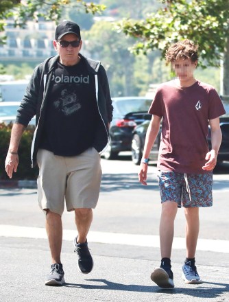 Malibu, CA  - *EXCLUSIVE*  - Charlie Sheen shopping with his twin son at a surf store and enjoying lunch together at Subway in Malibu.Pictured: Charlie SheenBACKGRID USA 25 JULY 2023 BYLINE MUST READ: @MALIBUUSTARS YOUTUBE / BACKGRIDUSA: +1 310 798 9111 / usasales@backgrid.comUK: +44 208 344 2007 / uksales@backgrid.com*UK Clients - Pictures Containing ChildrenPlease Pixelate Face Prior To Publication*