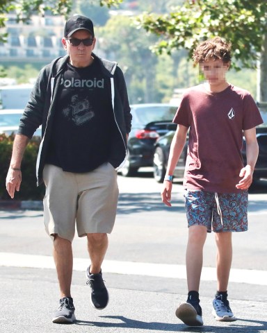 Malibu, CA  - *EXCLUSIVE*  - Charlie Sheen shopping with his twin son at a surf store and enjoying lunch together at Subway in Malibu.

Pictured: Charlie Sheen

BACKGRID USA 25 JULY 2023 

BYLINE MUST READ: @MALIBUUSTARS YOUTUBE / BACKGRID

USA: +1 310 798 9111 / usasales@backgrid.com

UK: +44 208 344 2007 / uksales@backgrid.com

*UK Clients - Pictures Containing Children
Please Pixelate Face Prior To Publication*