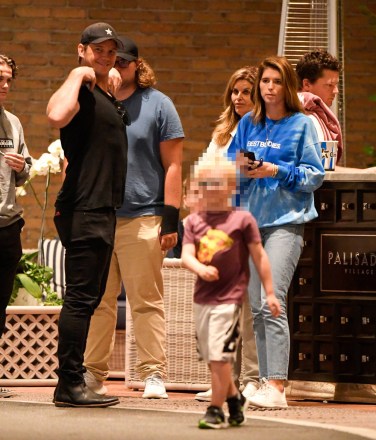EXCLUSIVE: Chris Pratt and his son, Jack join Katherine Schwarzenegger, Maria Shriver, and Christopher Schwarzenegger at a family at a showing of 