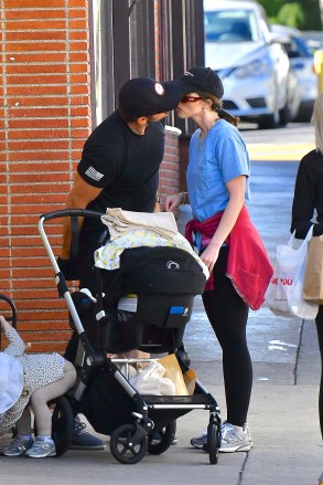 Los Angeles, CA  - *EXCLUSIVE*  - Happy couple Katherine Schwarzenegger and Chris Pratt stop to share a quick smooch while shopping at the farmers market with their kids.Pictured: Katherine Schwarzenegger , Chris PrattBACKGRID USA 20 NOVEMBER 2022 BYLINE MUST READ: Boaz / BACKGRIDUSA: +1 310 798 9111 / usasales@backgrid.comUK: +44 208 344 2007 / uksales@backgrid.com*UK Clients - Pictures Containing ChildrenPlease Pixelate Face Prior To Publication*