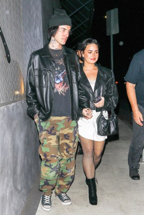 LOS ANGELES, CALIFORNIA - *EXCLUSIVELY* - A smitten Demi Lovato holds hands with boyfriend Jute after enjoying a date night at Crossroads Kitchen in Los Angeles.  @backgrid.comUK: +44 208 344 2007 / uksales@backgrid.com *UK Customers - Please pixelate her face before publishing any photos with children*