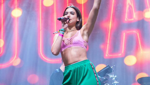 Dua Lipa just re-wore her fave cross neck sports bra and leggings