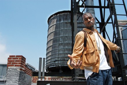 Singer Kanye West poses on the rooftop of New York Music's Soho section KANYE WEST, NEW YORK, USA